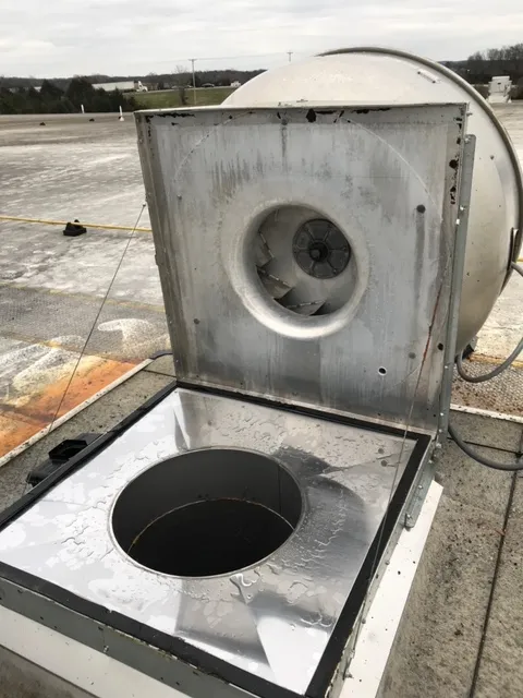 Hood cleaning technician at work